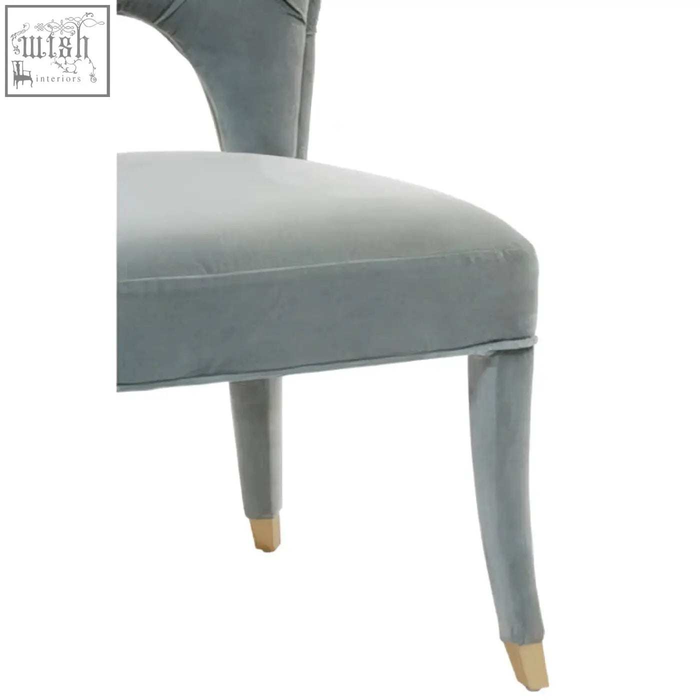Gray velvet tufted dining chair with gold-colored feet perfect for stylish velvet tufted dining spaces
