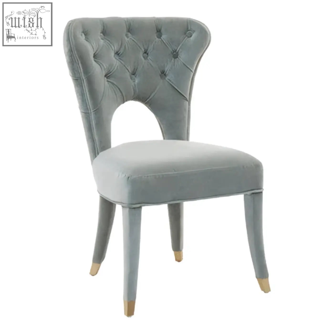 Light gray velvet tufted dining chair with gold tipped legs perfect alternative to blue velvet tufted style
