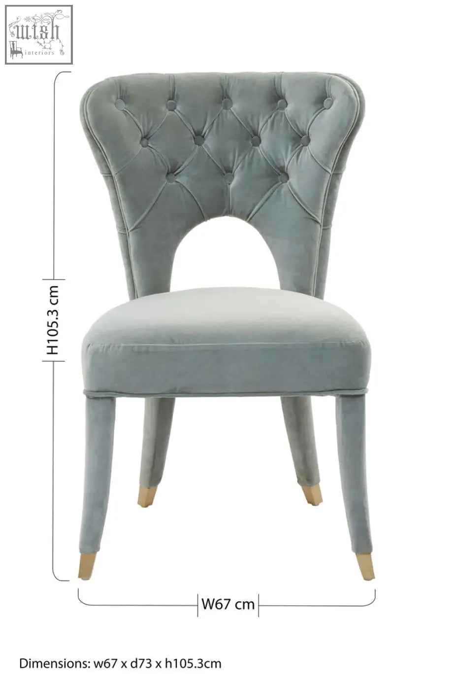 A light gray velvet tufted dining chair with a curved back and gold feet perfect for stylish dining rooms