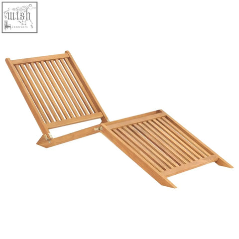 Light brown teak wood foldable lounge chair with slatted back and seat perfect as a weather resistant sun lounger