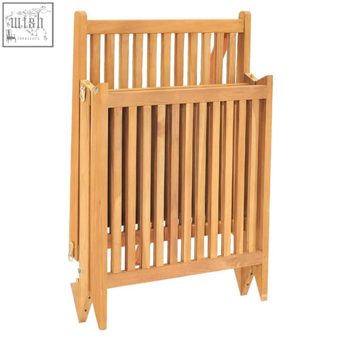 Light brown teak wood folding magazine rack with vertical slats and gold hinges perfect for weather resistance use