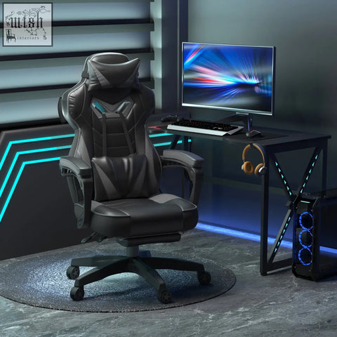 Vinsetto black gaming chair with faux leather upholstery padded lumbar support and adjustable armrests with teal stitching