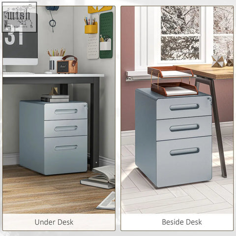 Light gray metal filing cabinet with three drawers two small silver handles and two keys included for secure storage