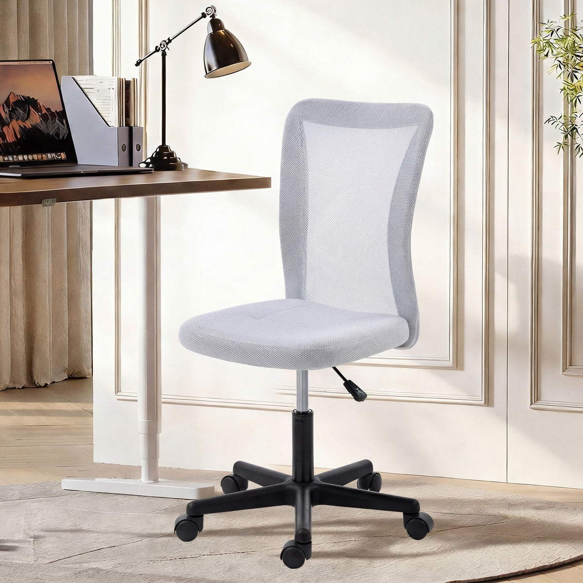 Light gray vinsetto mesh office chair with adjustable height black base and casters for desk use