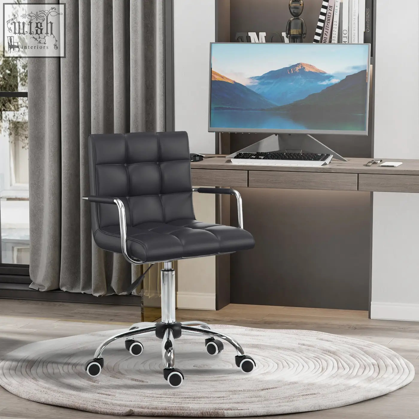 Black vinsetto office chair with chrome armrests and base featuring an under-seat lever for height adjustment