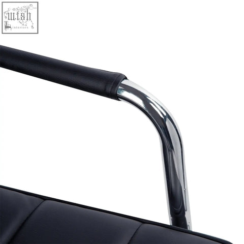 Black leather armrest with polished chrome frame on vinsetto office chair with under-seat lever and adjustable height