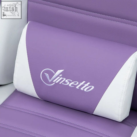 Purple and white vinsetto racing gaming chair headrest with silver logo embroidered on faux leather upholstery and bunny ears