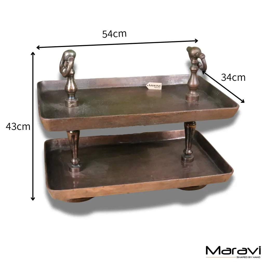 Vintage 2 tier serving tray in copper with antique brass tier serving tray featuring ornate handles and slender legs