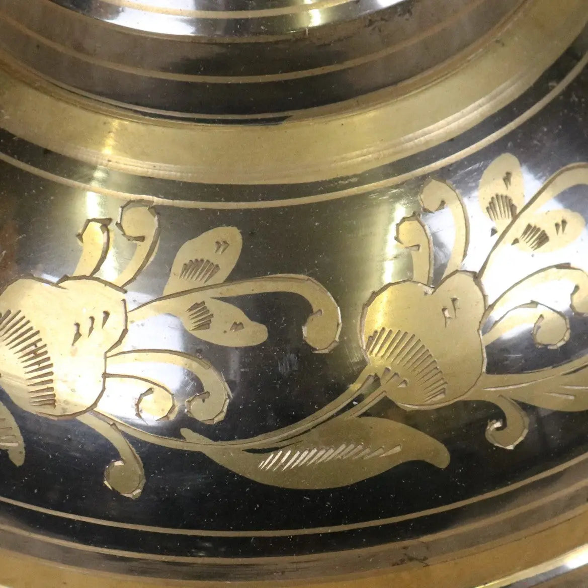 Vintage large brass vase with hand-etched black and gold floral engravings and silver and gold polished finish