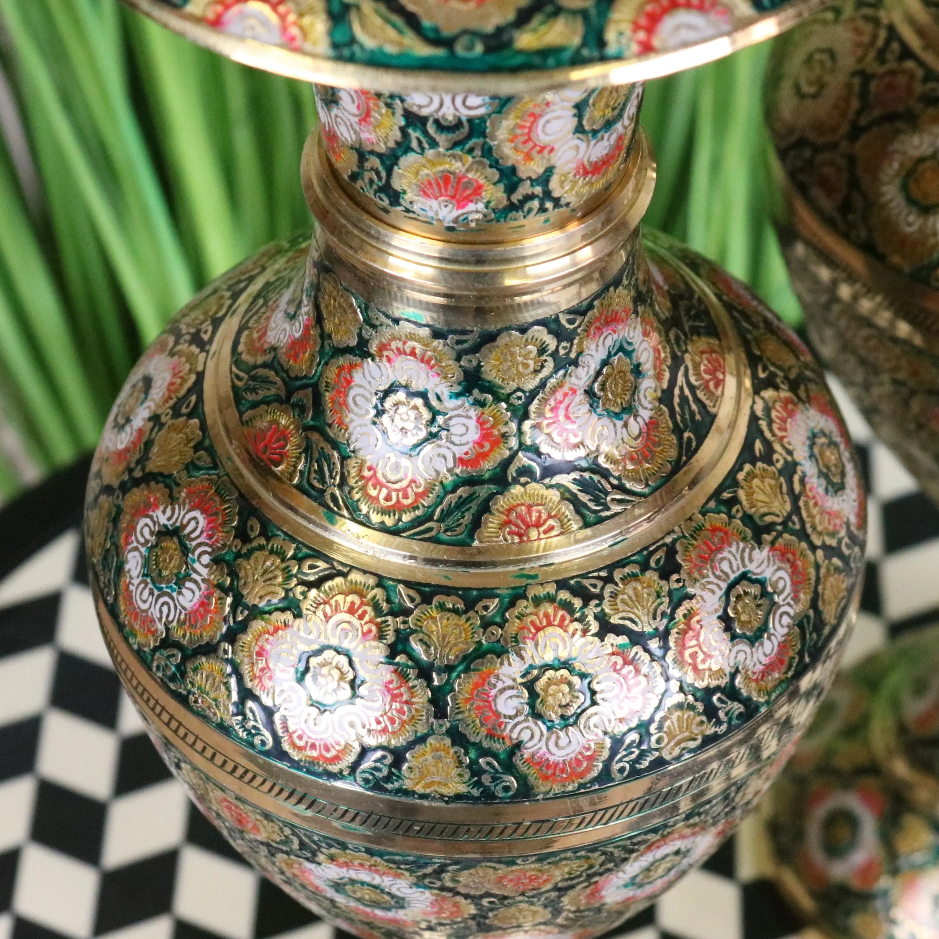 A vintage brass vase pair 38cm with dark green base hand painted floral patterns and polished brass bands