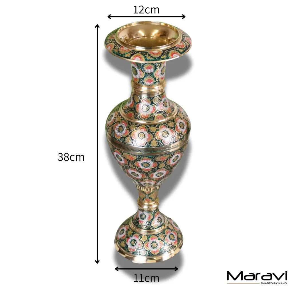 A 38cm tall vintage brass vase hand painted with intricate pink green and gold floral patterns