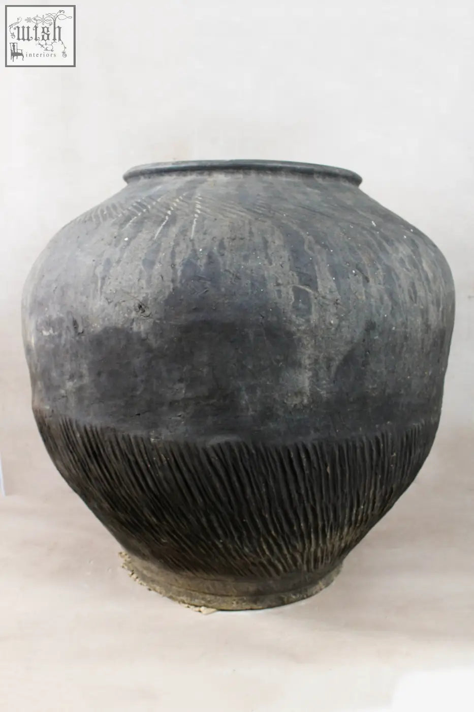 Vintage dark pot xl nº 7 with a weathered dark gray ceramic body and unglazed exterior by village potter