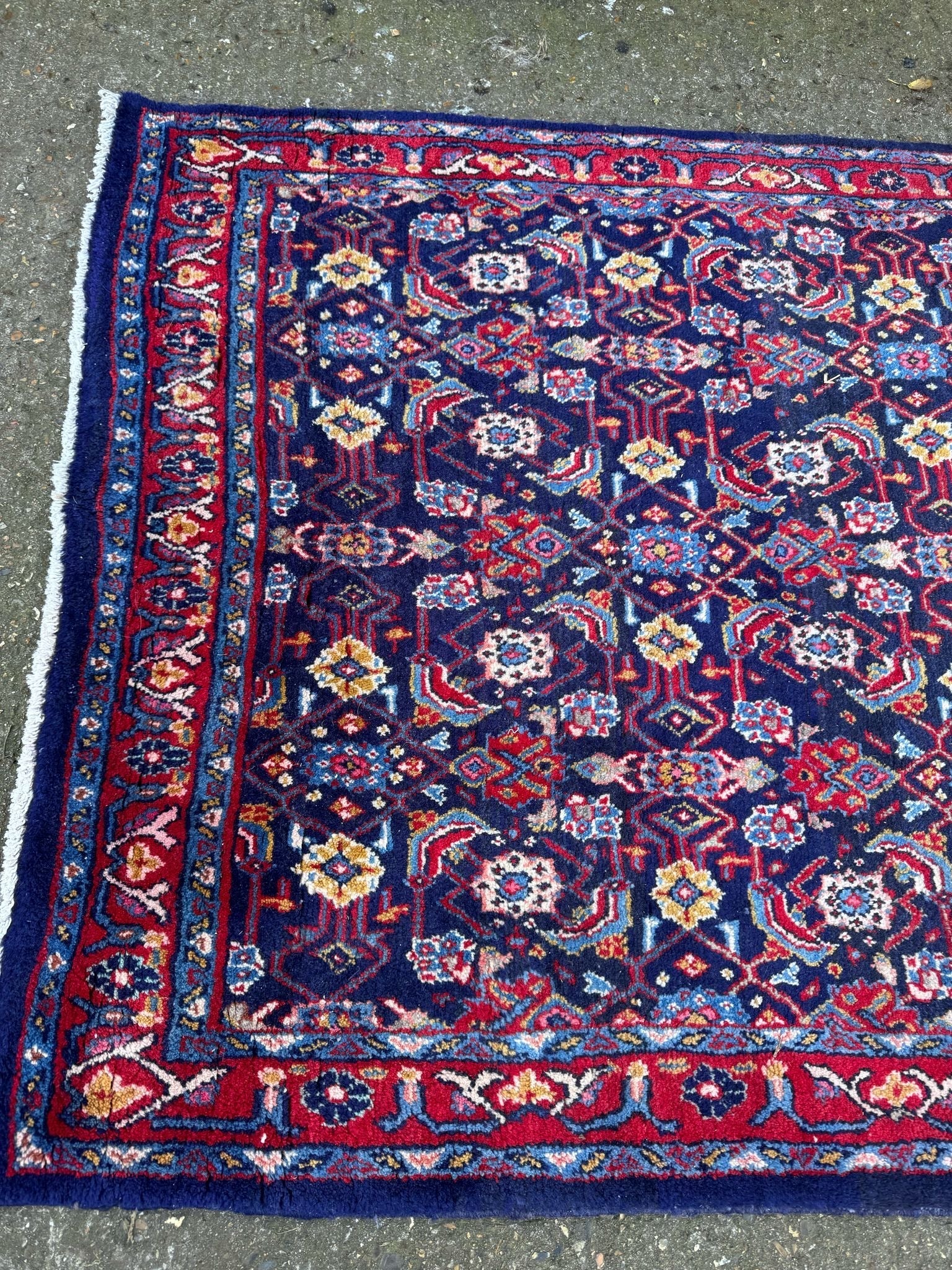Vintage handmade wool rug with navy blue field and intricate floral geometric patterns arak sourak sarough 300cm x 133cm