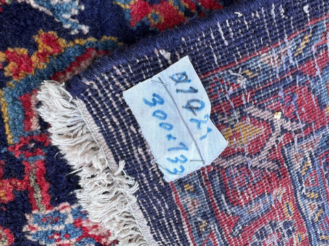 Vintage handmade wool rug arak sourak sarough with deep blue red gold pattern and frayed white fringe 300cm x 133cm