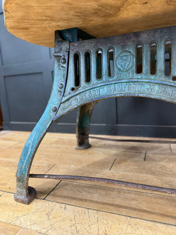 Vintage industrial dining table cast iron base in turquoise with ornate scrollwork and henry bamford and sons branding
