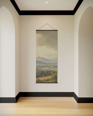 A vintage landscape tapestry hanging scroll with muted greens browns and grays showing rolling hills and soft sky