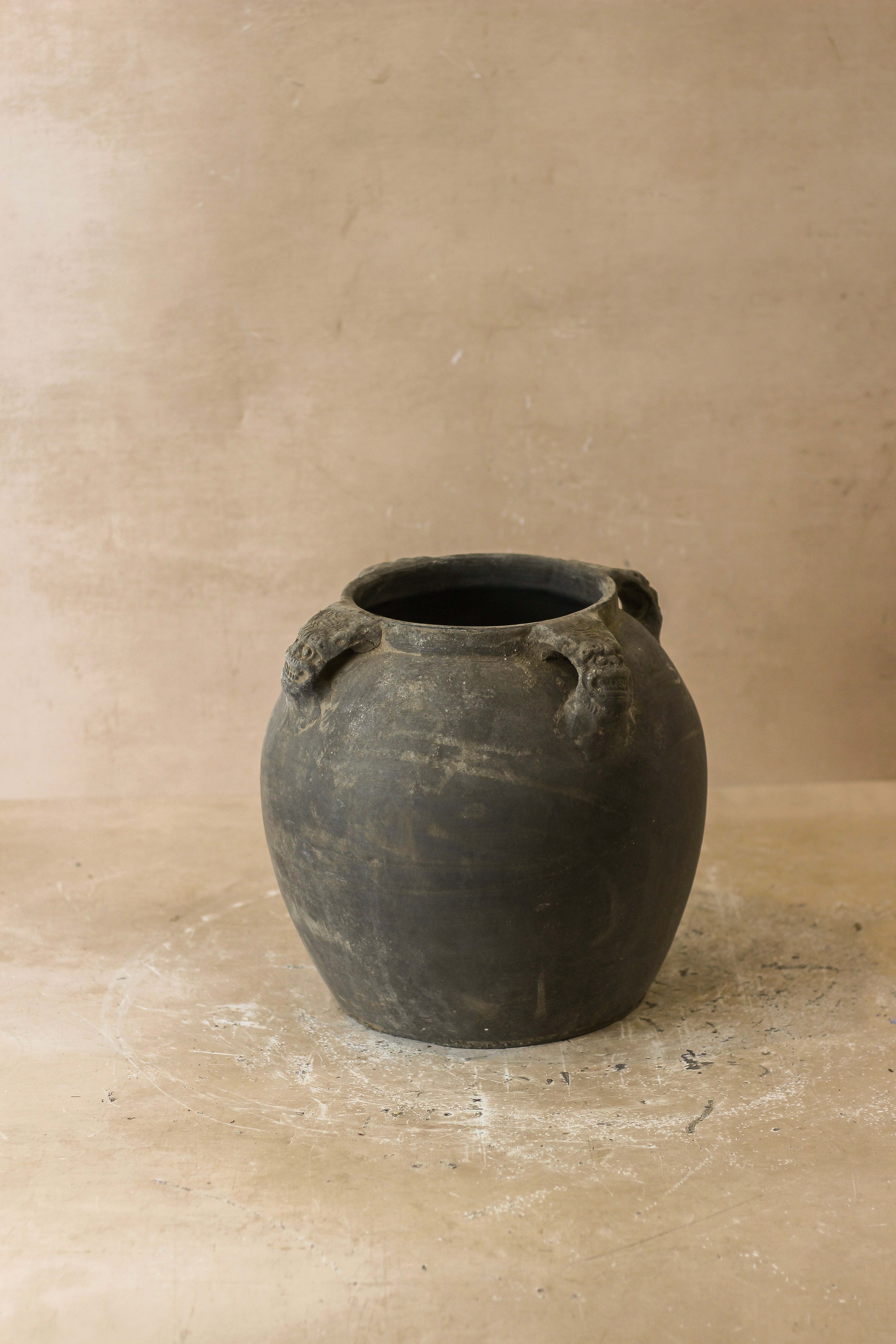 Dark gray ceramic vintage lion ears pot with two sculpted handle accents perfect for decoration
