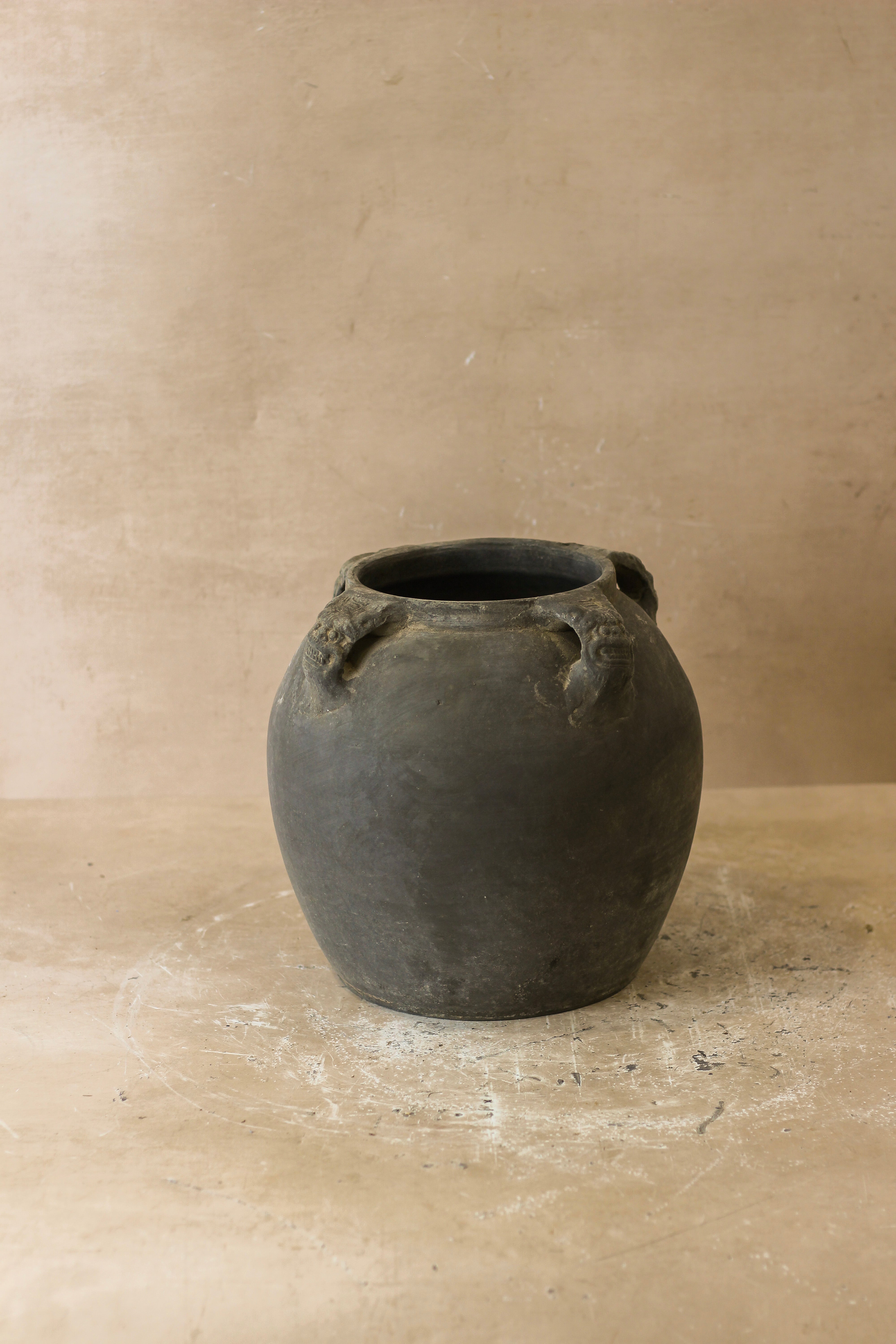 Dark gray vintage lion ears ceramic jar with two sculpted handles perfect for stylish storage or decor