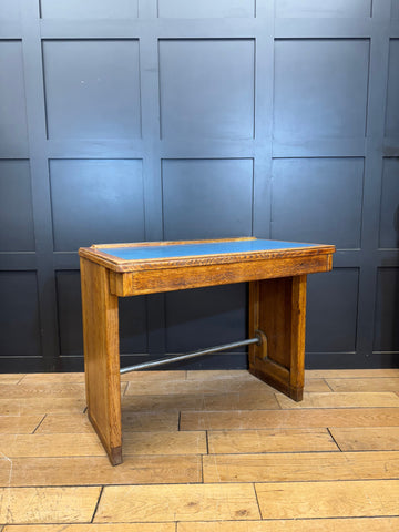 Vintage oak desk with blue leather top and metal stretcher bar perfect as a computer or office desk