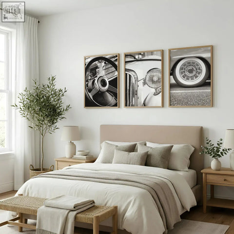 Three framed black and white vintage posters featuring classic car parts as wall art above a bed