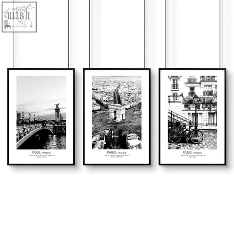 Set of 3 black-framed paris-themed wall art prints featuring monochrome iconic city scenes and text labels