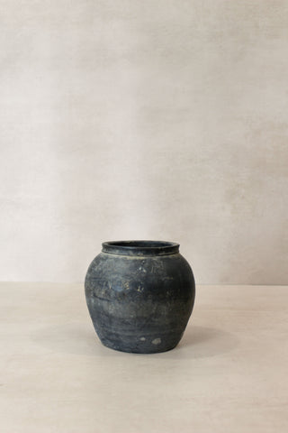 Dark gray weathered ceramic vintage pot n° 20 with rounded body and slightly flared rim