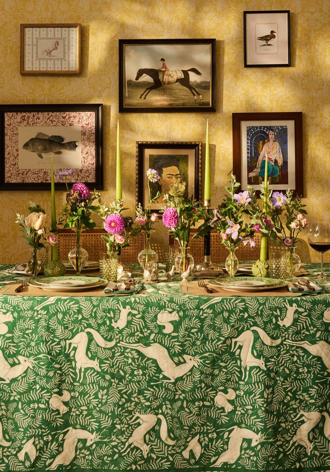 Green vintage racing day glory tablecloth with cream running deer silhouettes and foliage design