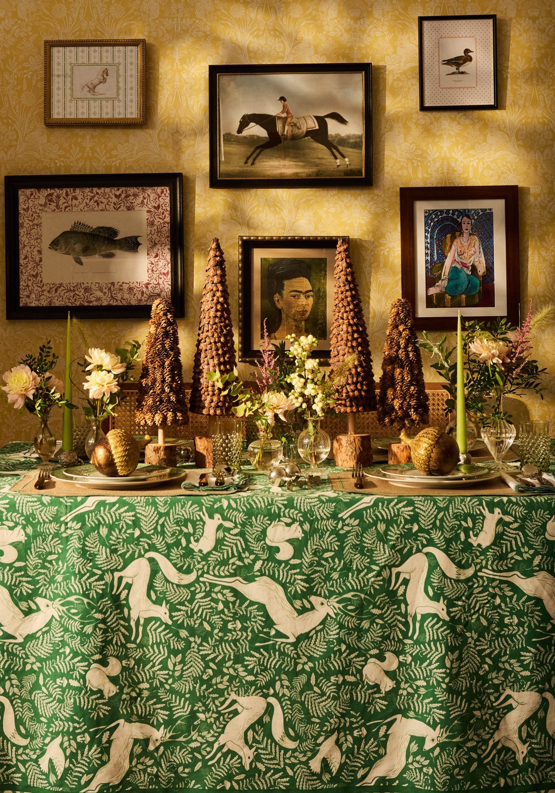 Green tablecloth with white vintage racing day glory horse prints featuring animal and foliage patterns
