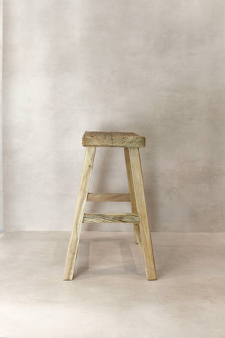 Vintage rustic elm wood stool medium with weathered light beige finish and visible wood grain texture