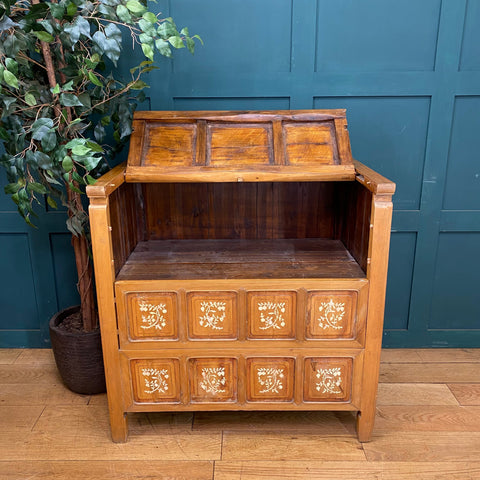 Vintage dowry chest wooden secretary desk with honey-toned finish and decorative floral inlaid drawers and ornate top panel