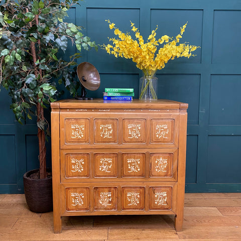 Vintage warm-toned wooden dowry chest with nine floral inlaid panels perfect as a sideboard or cocktail cabinet