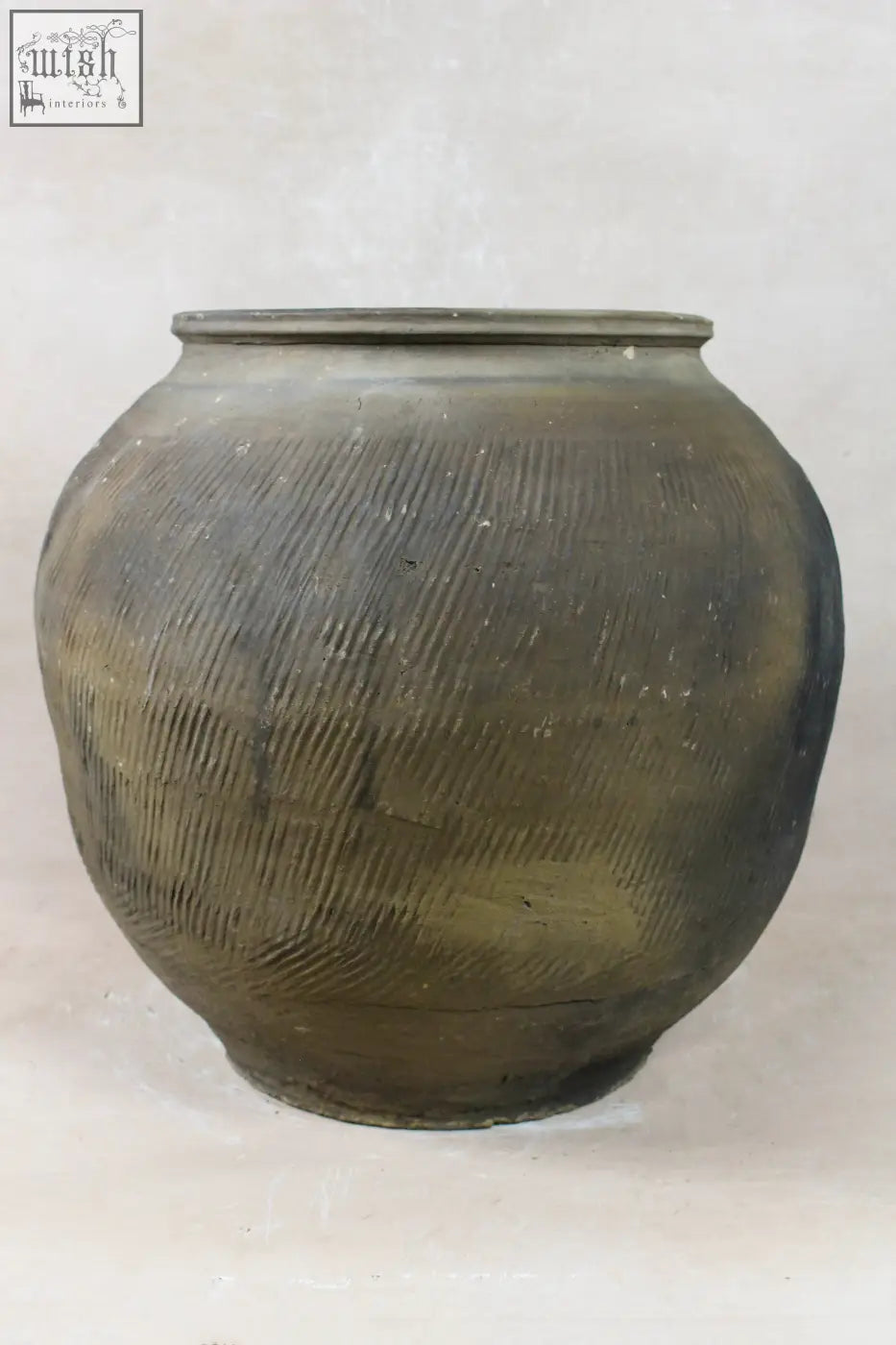 A vintage textured grey ceramic jar with fine diagonal ridges and subtle tonal variations vintage textured grey pot vt19