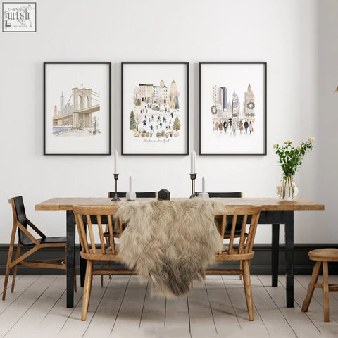 Three framed vintage travel art prints in beige watercolor of new york city scenes above a wooden dining room table