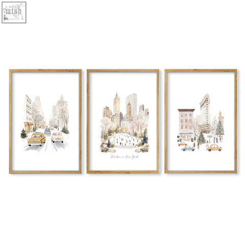 Three vintage travel art prints of beige winter in new york scenes framed in light wood, perfect for a dining room display
