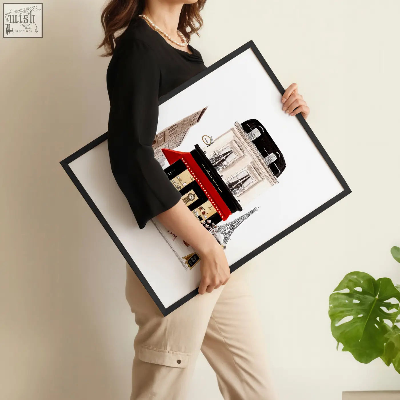 Black-framed vintage travel art prints featuring stylized parisian landmarks with bold red and black accents wall art