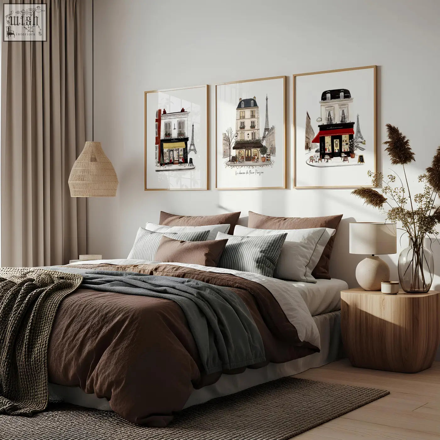 Three vintage travel paris wall art prints featuring muted architectural sketches and eiffel tower silhouettes above a bed