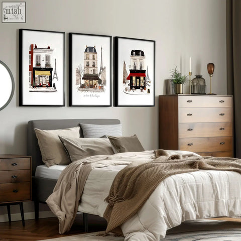 Three framed black vintage travel parisian street scene art prints with white matting featuring eiffel tower buildings