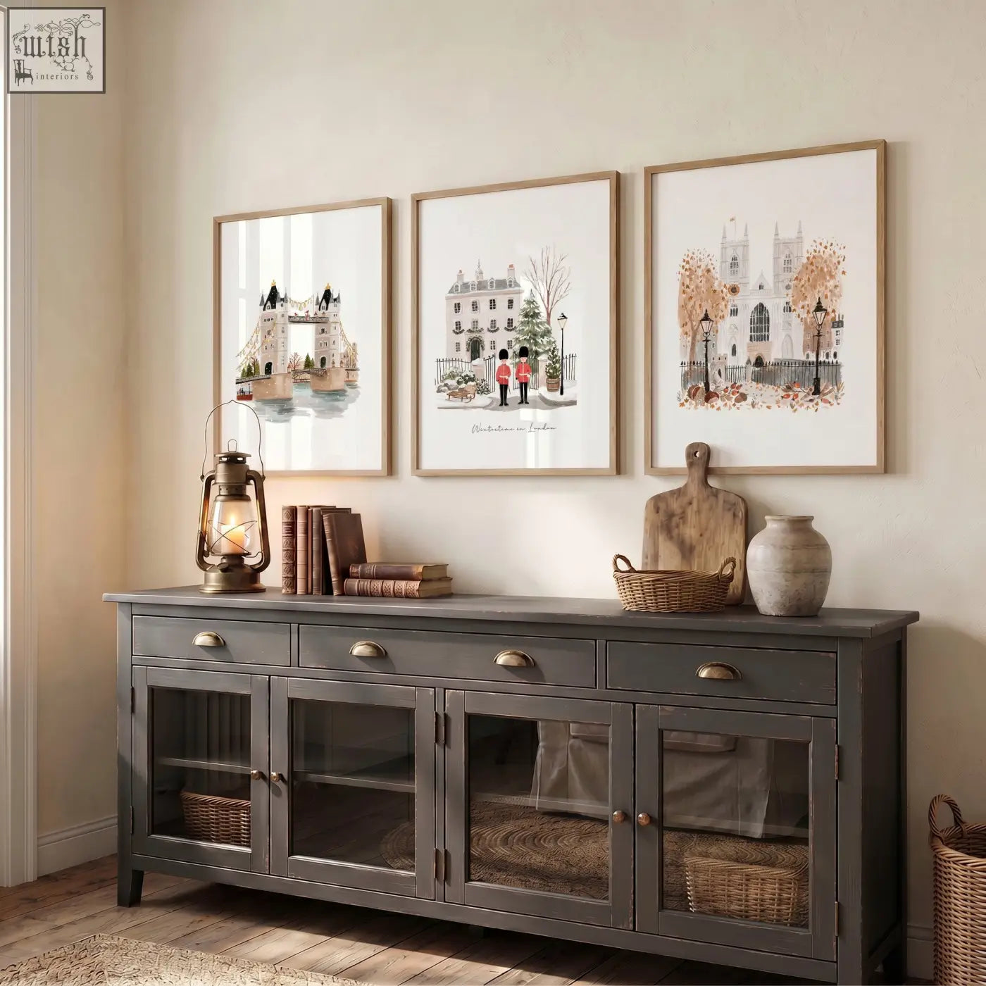Dark gray wooden sideboard with glass-paneled doors and brass handles perfect for displaying vintage travel posters art