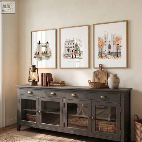 Dark gray wooden sideboard with glass-paneled doors and brass handles perfect for displaying vintage travel posters art