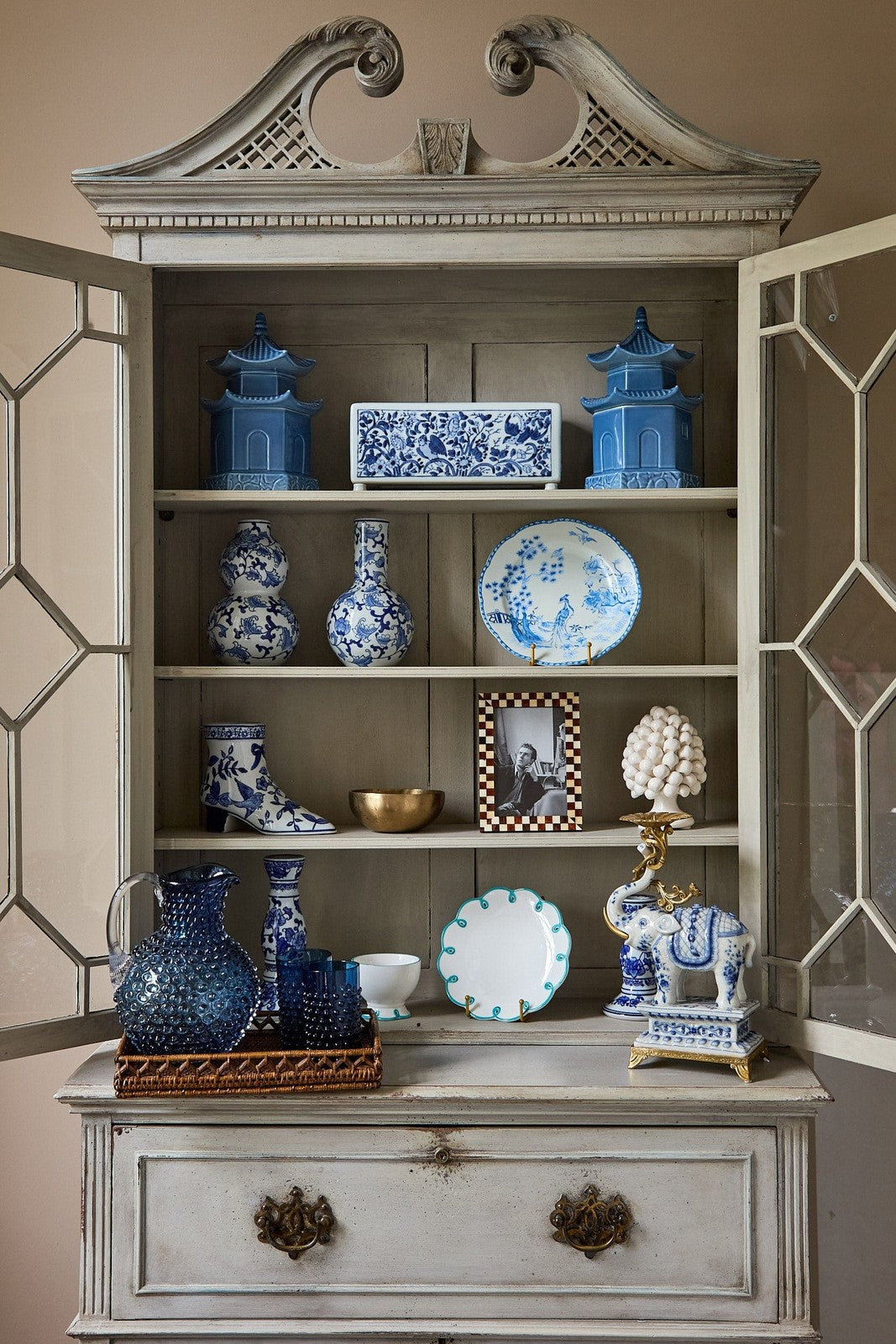 Blue and white porcelain decorative cabinet with ornate carvings complementing virginia dessert plates set of 4