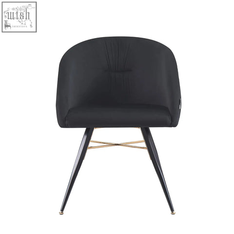 Black vittorio velvet dining chair with curved backrest and gold metal legs perfect for kitchen or dining room
