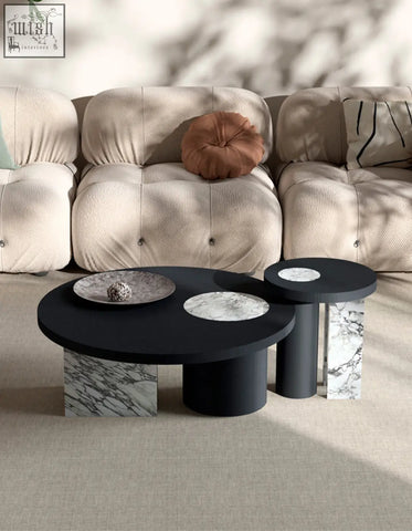 Set of three modern black vivien coffee tables with marble bases and circular tops perfect for wood coffee decor