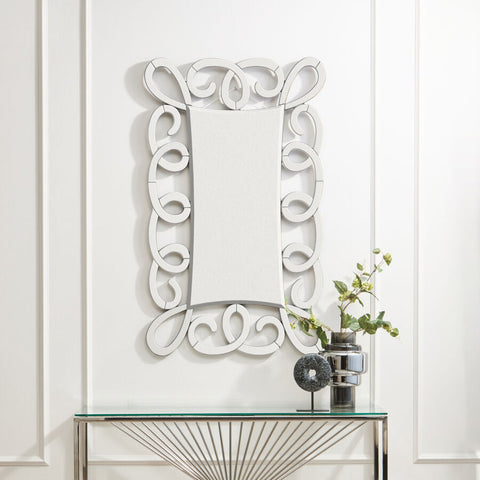 Vivienne black and silver scroll design wall mirror with an ornate silver scroll design frame and intricate swirling patterns