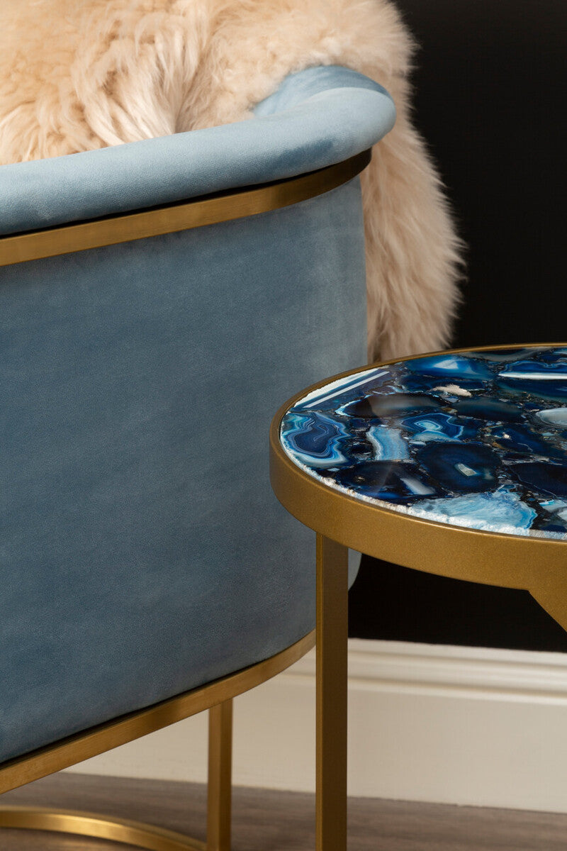 Vizzini round agate side table with a vibrant blue round agate top and antique brass metal frame