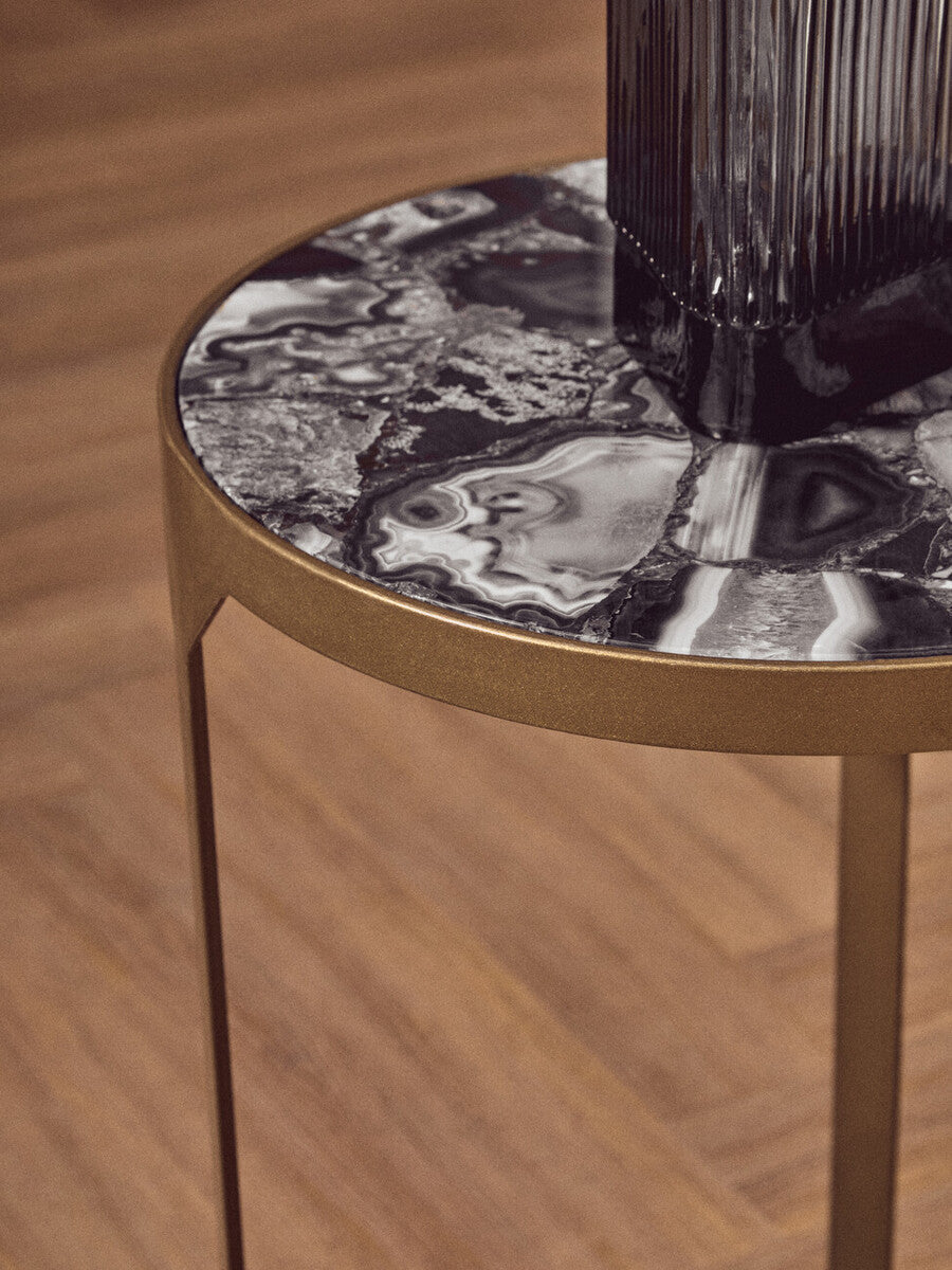 Vizzini round agate side table with sleek black and white round agate top and antique brass metal legs