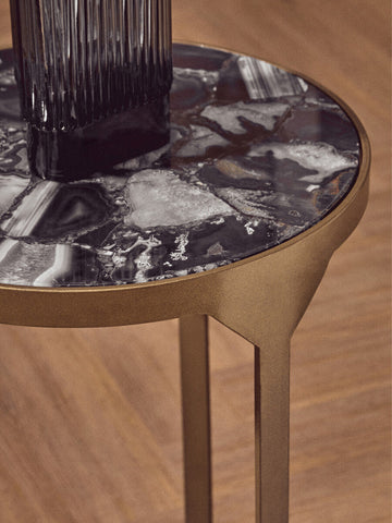 Vizzini round agate side table with sleek round agate top in black and white and antique brass metal base