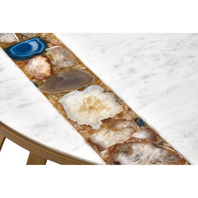Vizzini round coffee table with decorative agate stone runner in earthy tones and blue on white marble surface