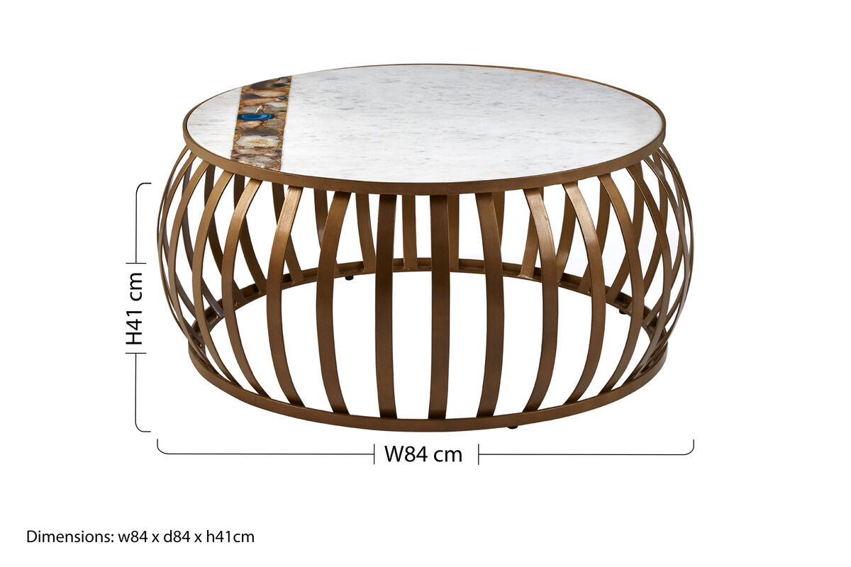 Vizzini round coffee table with a white marble top and ornate gold-toned metal frame with vertical slats