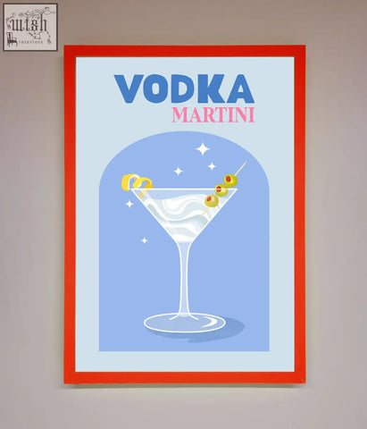 A vodka martini framed wall art with a stylized martini illustration in clear glass on a light blue background