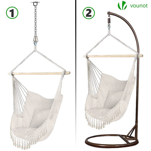 White macrame hammock swing chair with wooden support and fringe detailing for indoor or outdoor use